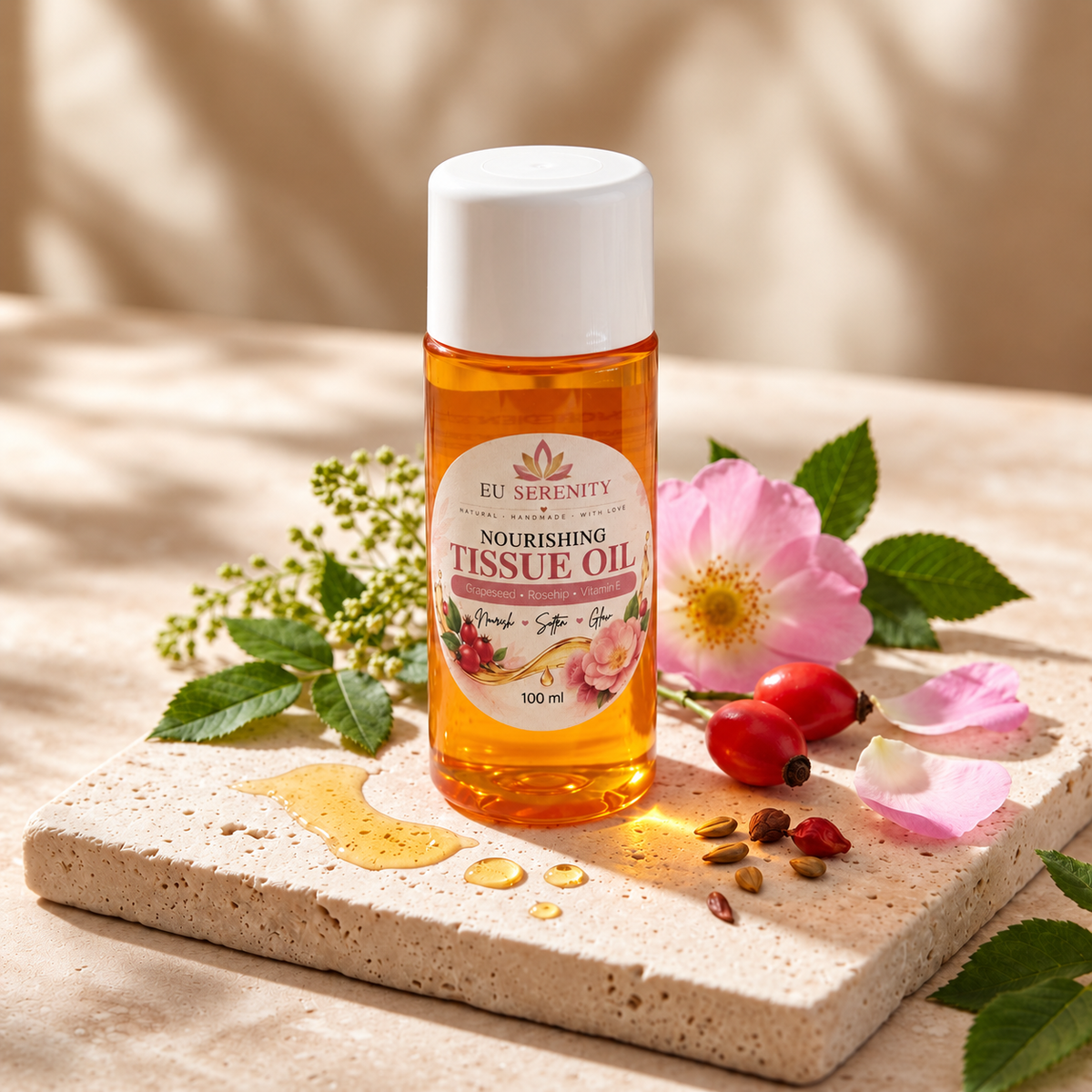 EU Serenity Nourishing Tissue Oil 100 ml with pink wild rose and rosehips on a stone tray