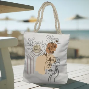 Luxury rope bag with abstract floral line art design on a chair at the beach