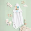 Personalised baby hooded towel with name flat lay baby gift