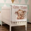 Sublimation polyester baby receiving blanket with elephant “Little Cutie” design hanging on crib