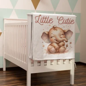 Sublimation polyester baby receiving blanket with elephant “Little Cutie” design hanging on crib
