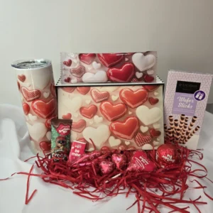 Valentine’s deluxe sweet gift box with chocolates, wafer sticks, heart-shaped sweets, tumbler, and festive red filler