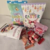 Personalised Easter Joy Treat Pack with marshmallow eggs, jelly eggs, chocolate bunny and Sweetie Pie Monster Rocks in festive Easter bags