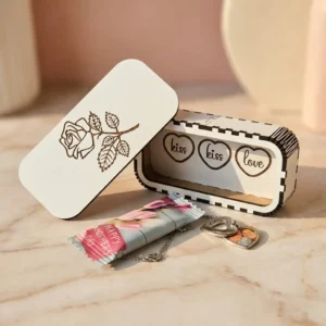 Personalised heart locket necklace with photo and gift box on soft fabric background