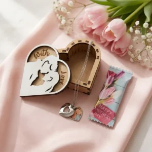 Close-up of personalised heart locket with photo inside and mother child gift box