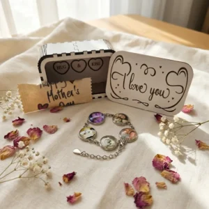 Personalised romantic charm bracelet with photo charms displayed in a bedroom setting with wooden I Love You gift box
